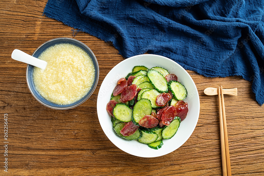 Cucumber fried sausage and millet porridge