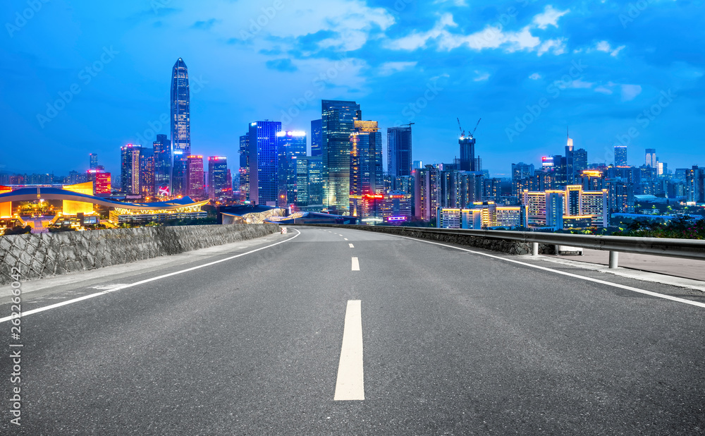 Road and skyline of urban architecture..