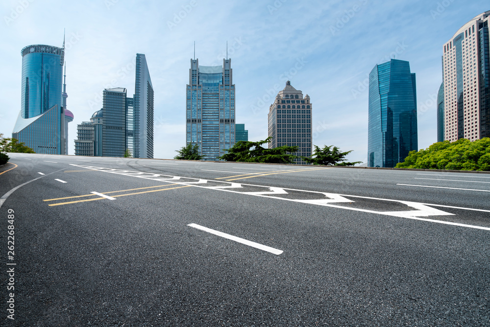 Empty Asphalt Road Through Modern City of Shanghai, China..