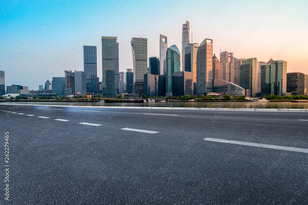 Empty Asphalt Road Through Modern City of Shanghai, China..