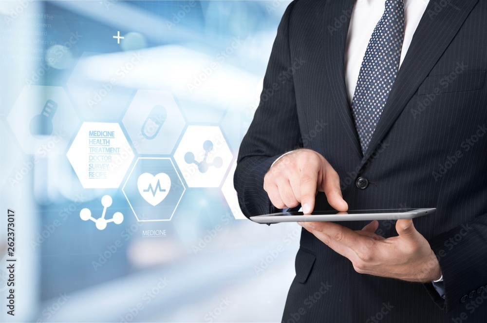 Close-up Doctor at hospital working with tablet pc