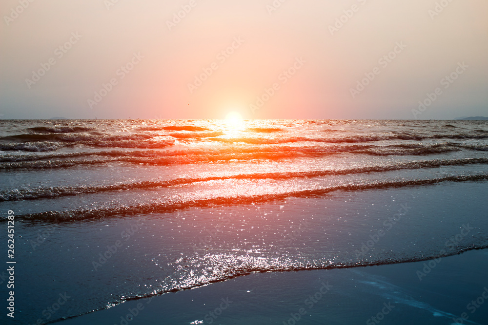 Sea waves at the beach in the evening