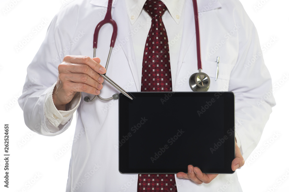 Medical doctor holding tablet facing the front on white background