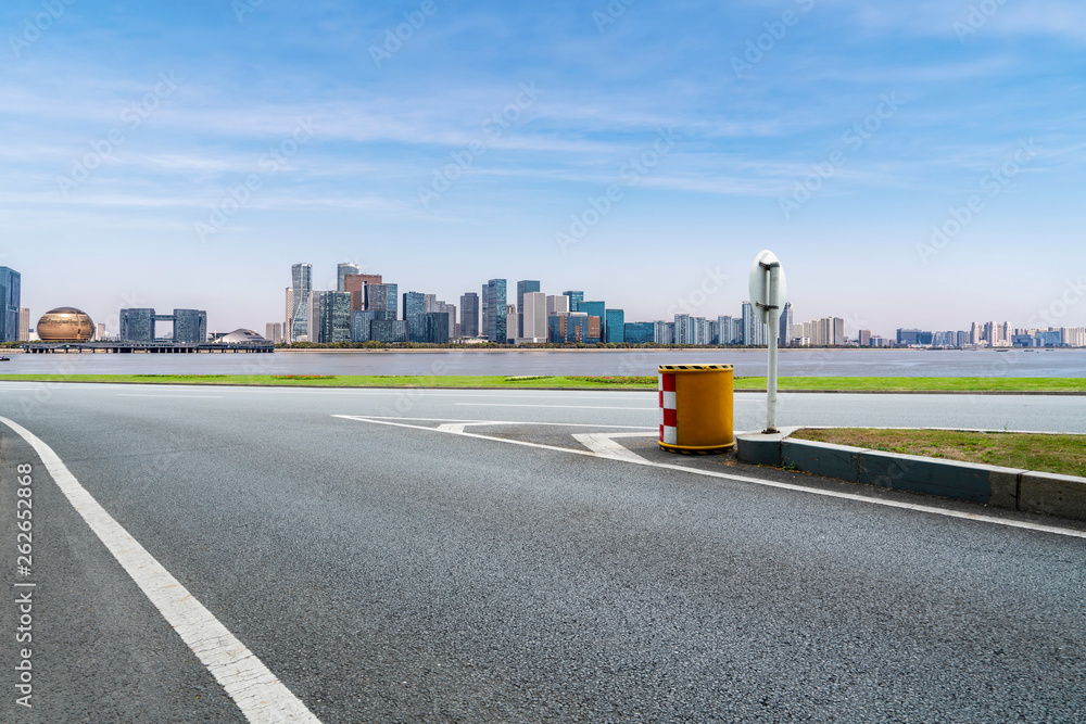 Road and skyline of urban architecture