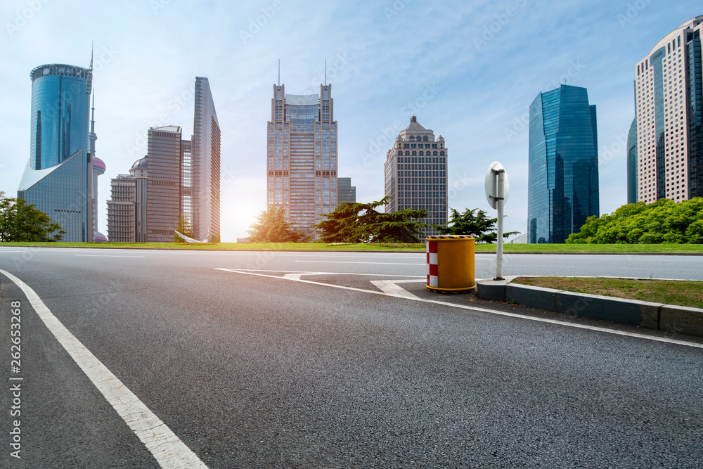 Empty Asphalt Road Through Modern City of Shanghai, China..