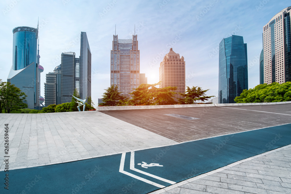 Urban skyscrapers with empty square floor tiles