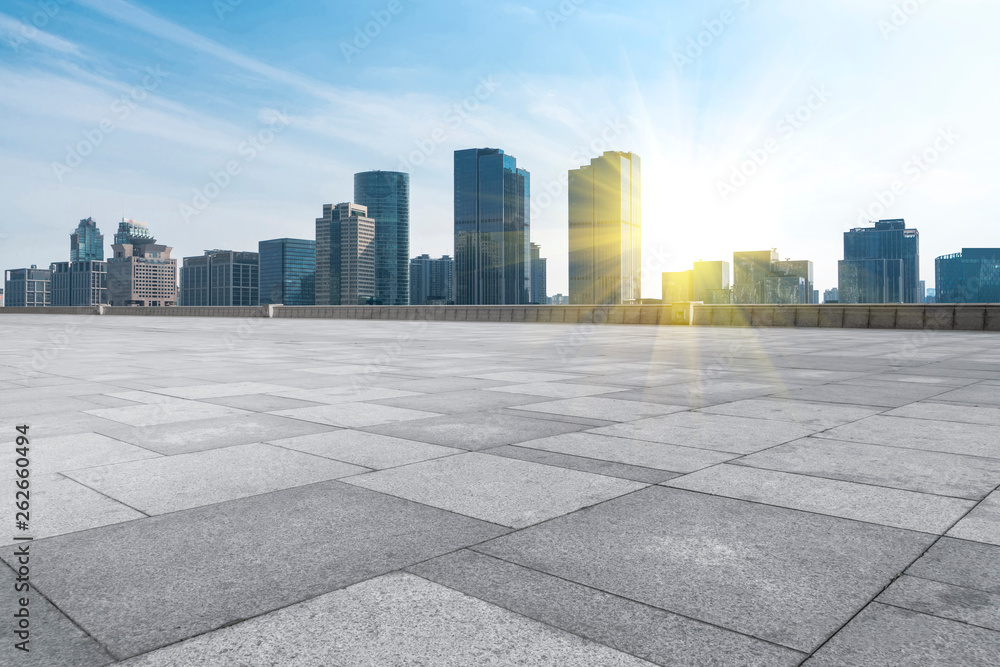 Urban skyscrapers with empty square floor tiles