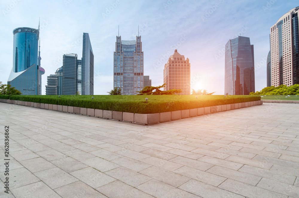 Urban skyscrapers with empty square floor tiles