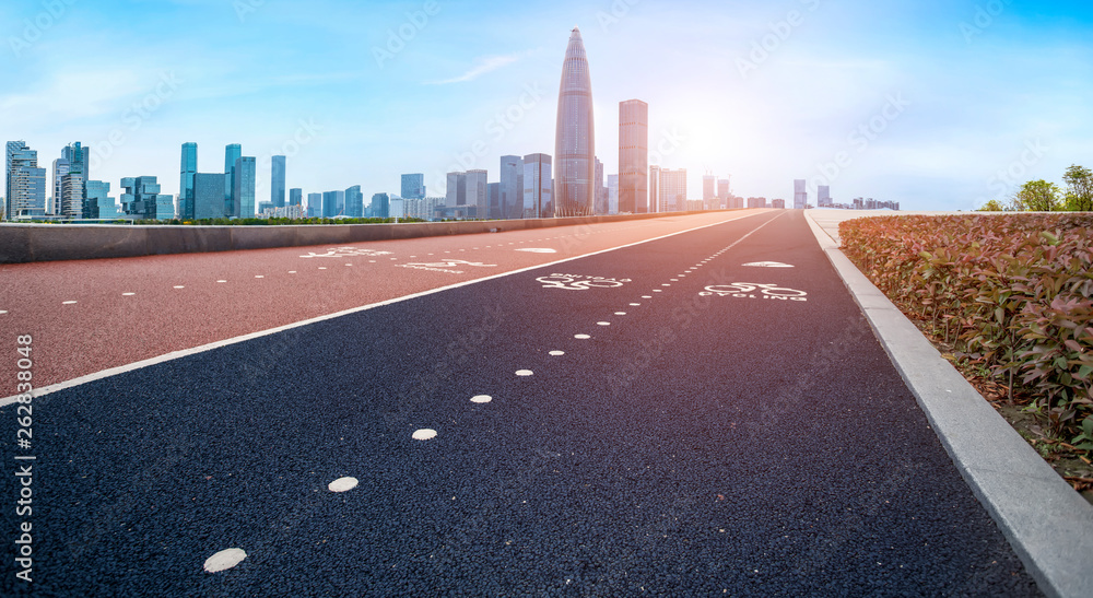 Road and skyline of urban architecture..