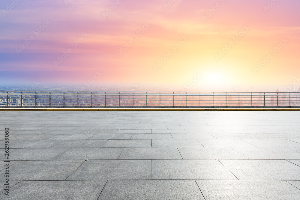 Shanghai city skyline and empty square floor with beautiful clouds scenery at sunset