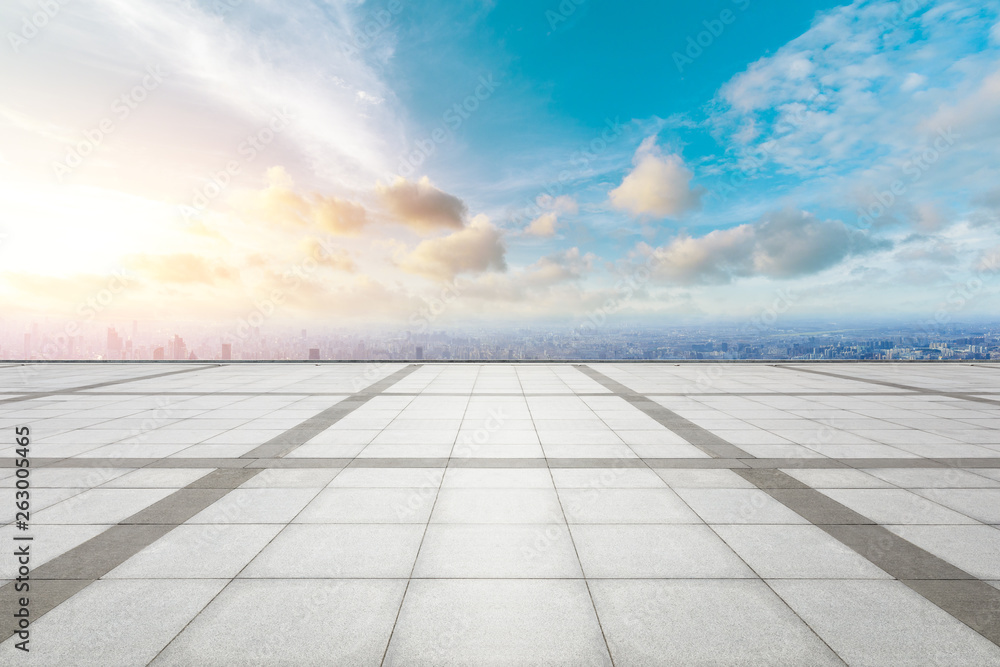 Shanghai city skyline and empty square floor with beautiful clouds at sunset,high angle view