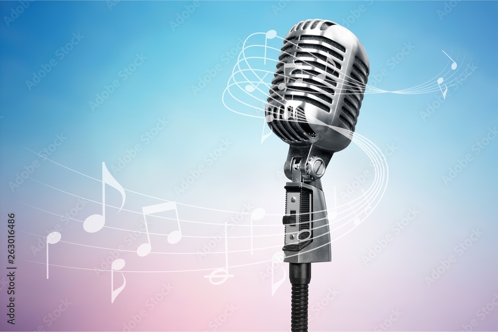 Retro style microphone on  background