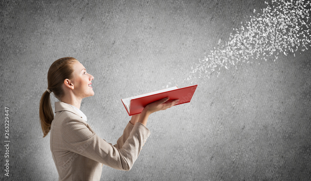 Woman looking at flying out random letters