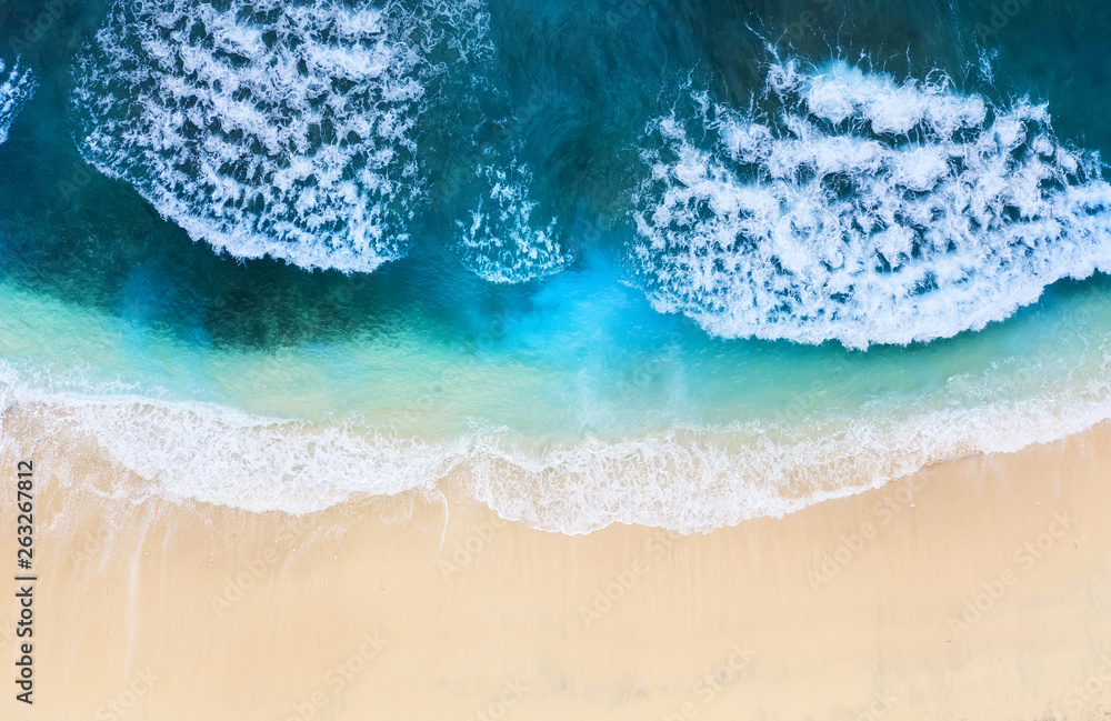 Beach as a background from top view. Turquoise water background from top view. Summer seascape from 