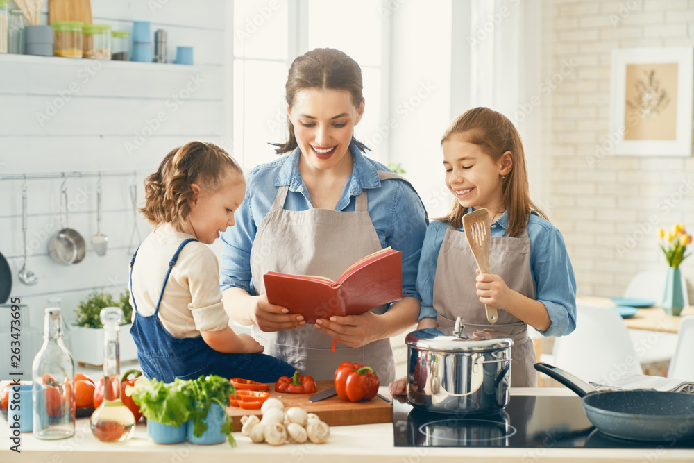 Happy family in the kitchen.