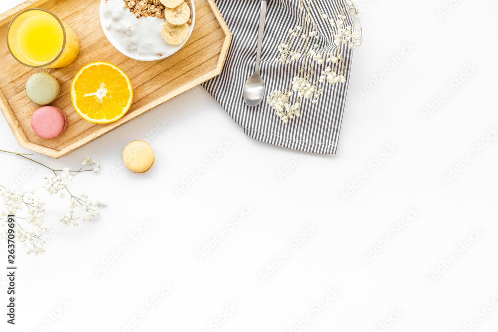 food for healthy breakfast with granola and fresh orange juice on bright white background top view m