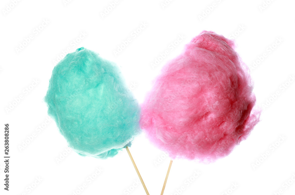 Different tasty cotton candies on white background