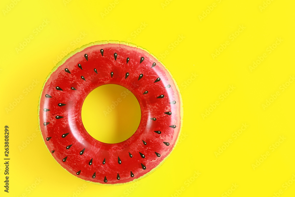 Inflatable ring on color background