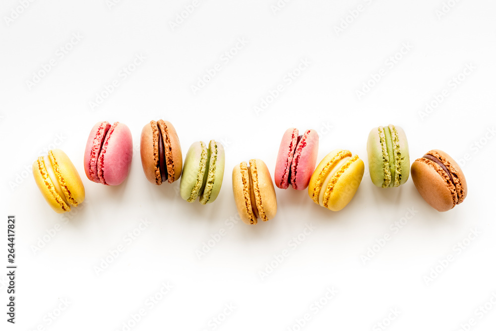 sweet dessert pattern with macarons on white background flat lay mockup