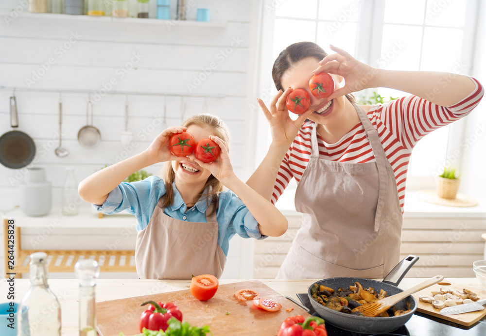 Happy family in the kitchen.