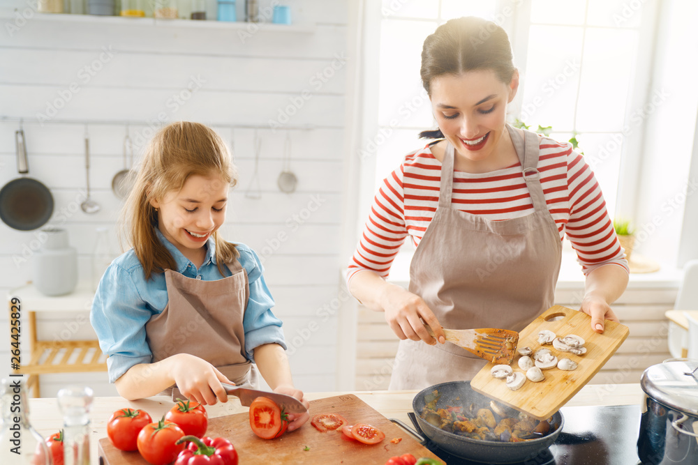 Happy family in the kitchen.