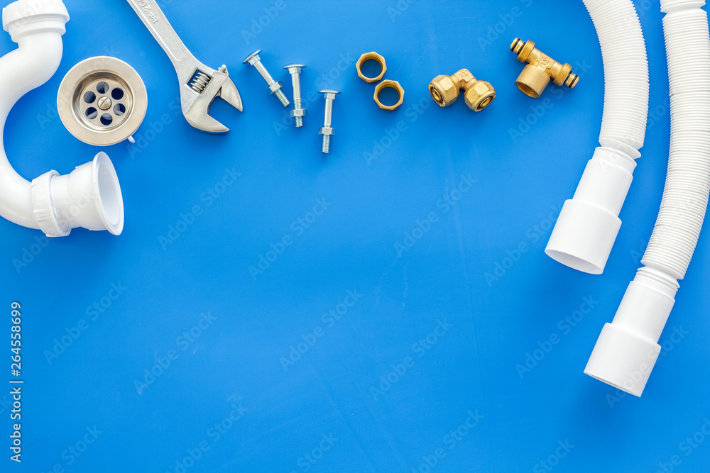 Plumber work with instruments, tools and gear on blue background top view mock up