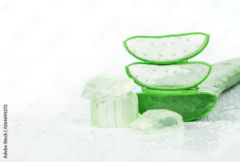 sliced and leaf of fresh aloe vera on white background