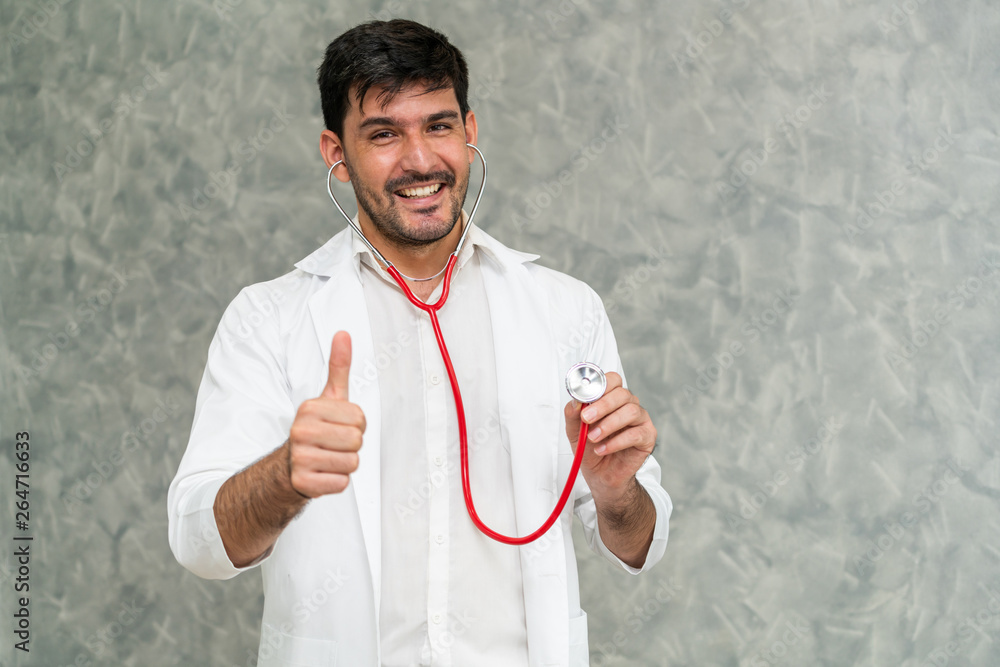 Young male doctor working at the hospital. Medical healthcare and doctor staff service.