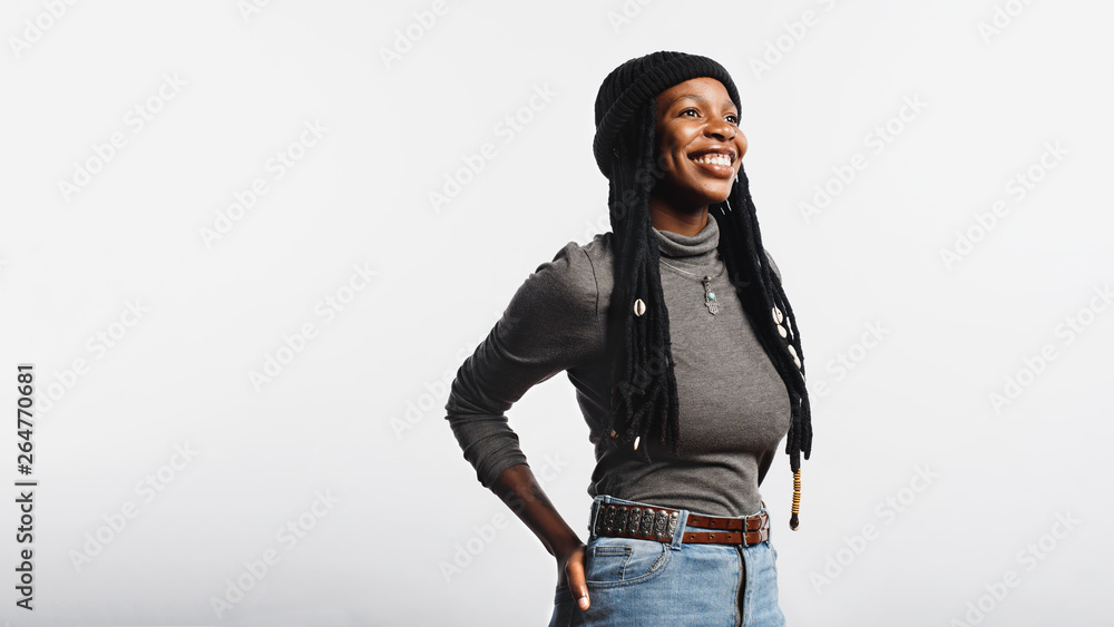 Smiling african female with long dreadlocks