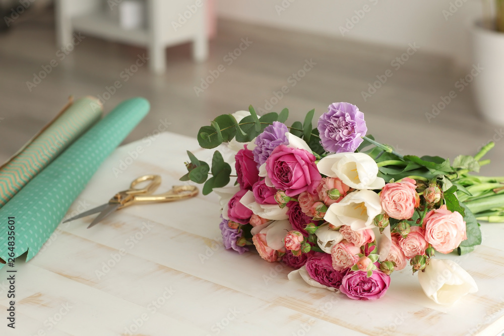 Bouquet of flowers on table in shop