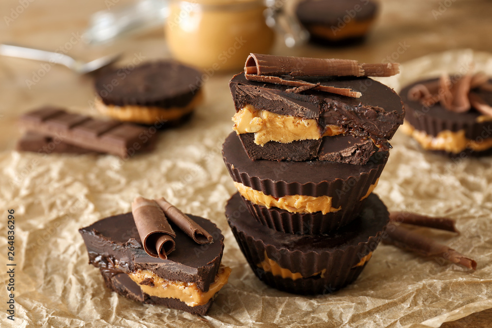 Tasty chocolate peanut butter cups on parchment