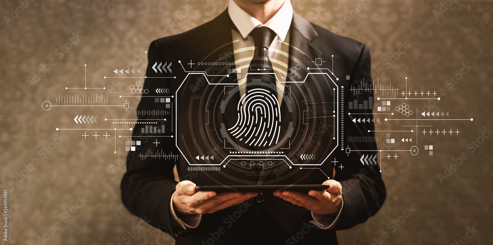 Fingerprint scanning theme with businessman holding a tablet computer