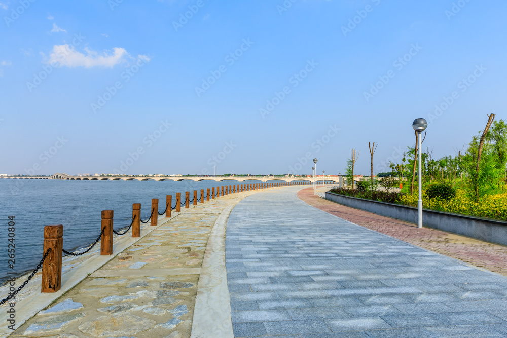 Beautiful lake and walkway with blue sky