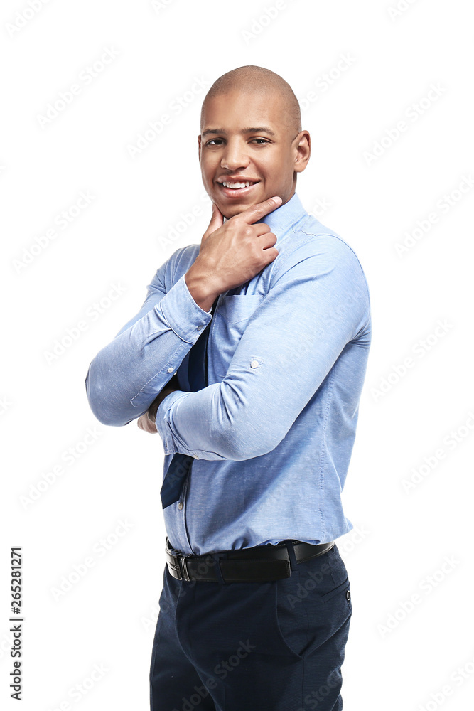 Handsome African-American businessman on white background