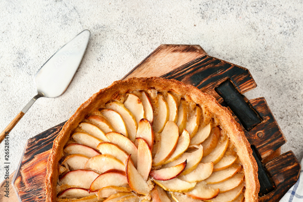 Tasty apple pie on table