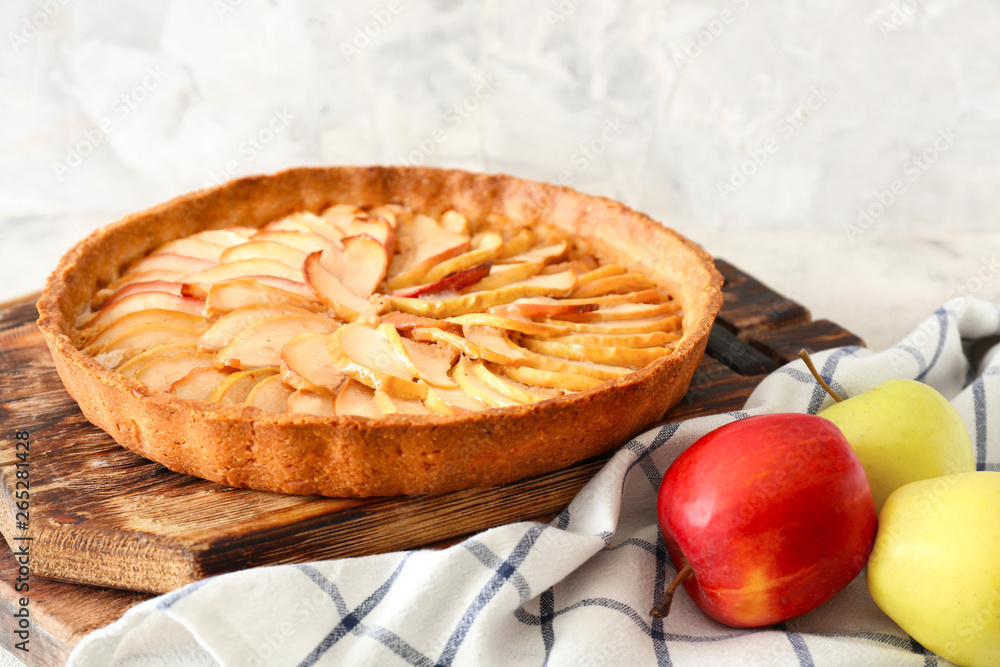 Tasty apple pie on table