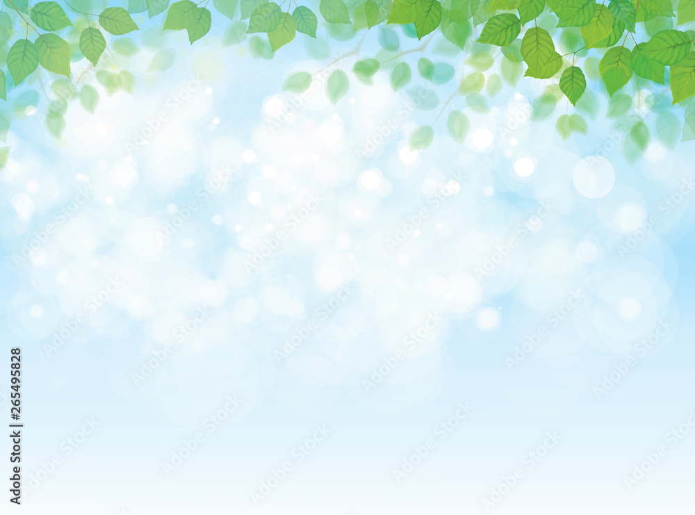 Vector green leaves  border  on blue sky background.