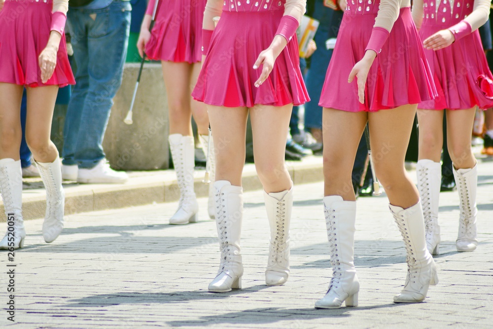 Cheerleaders closeup in a symmetrical formation 