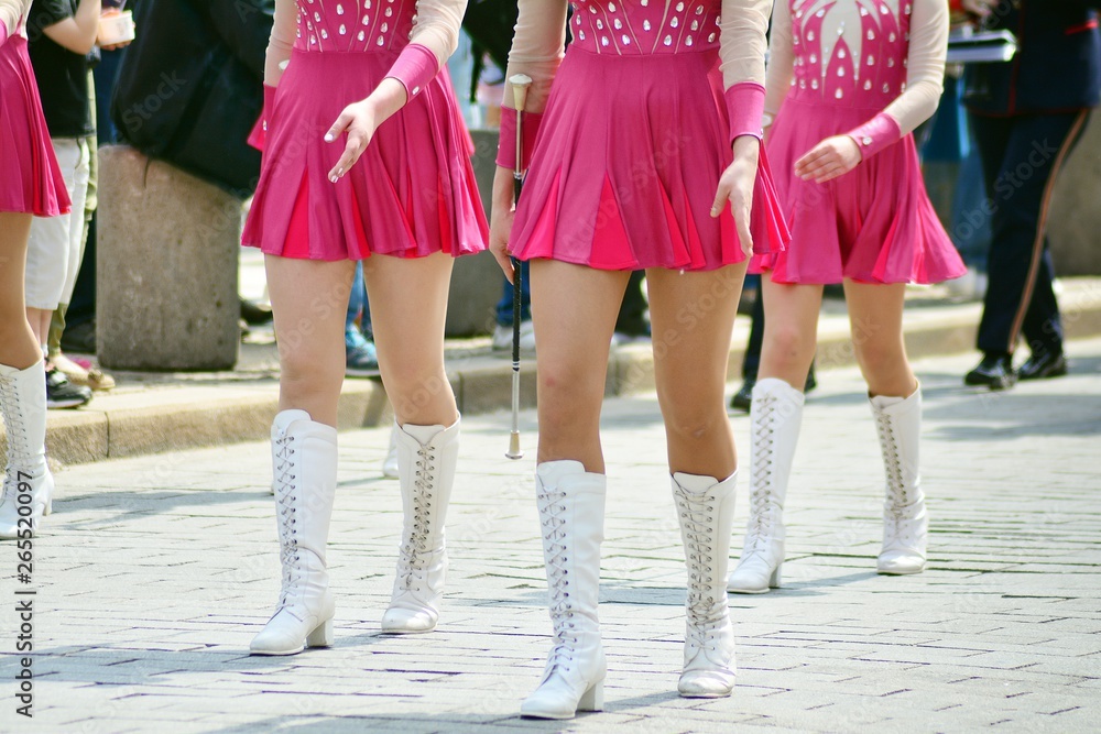 Cheerleaders closeup in a symmetrical formation 