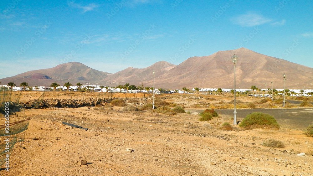 Landscape of desert and suburbs of Playa Blanca, Lanzarote, Canary Islands.