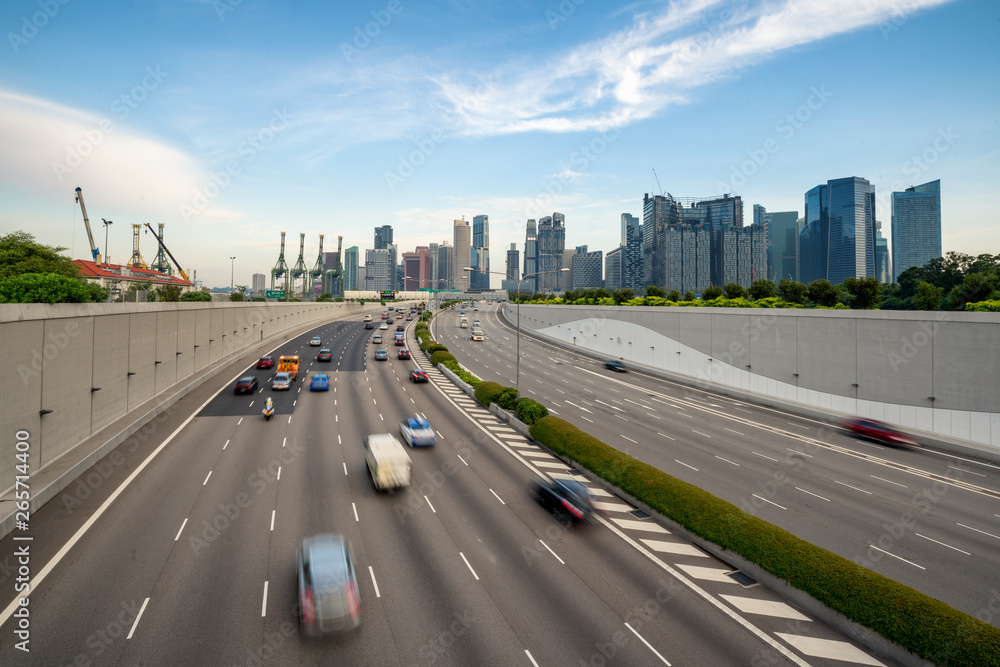 Singapore city, Marina bay finance and trade zone with traffic in city in morning at Singapore. Asia