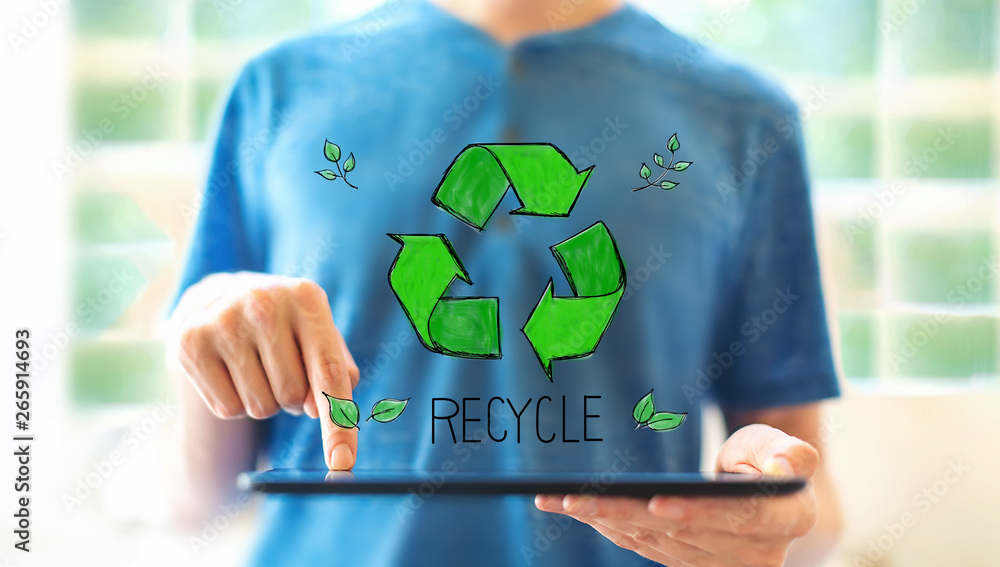 Recycle with young man using a tablet computer