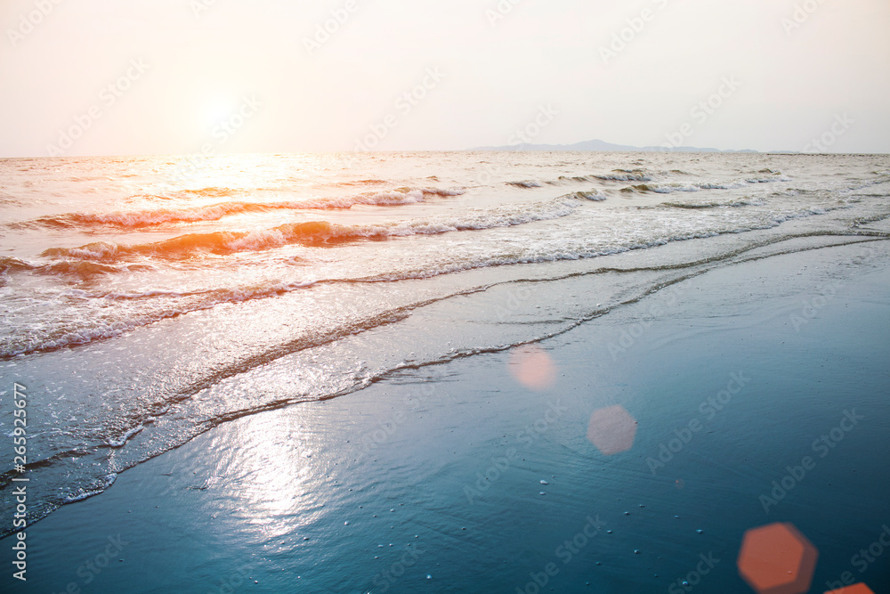 Sea waves at the beach in the evening