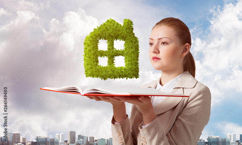 Woman with green plant shaped house