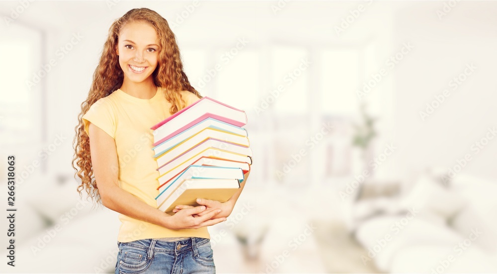 Young female student  in room