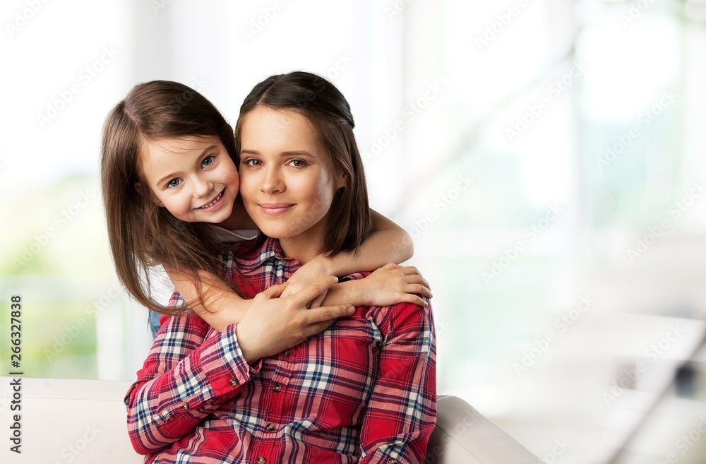 Happy Mother and daughter hugging