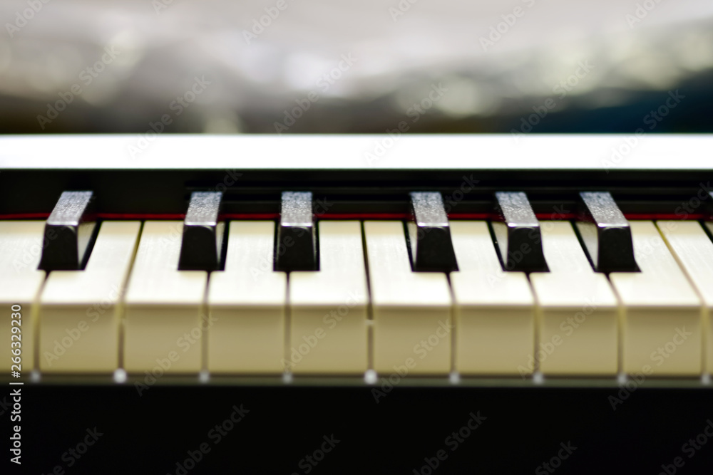 Keys of a digital piano, soft focusing, creative mood of a person improvisation and creativity. Midi