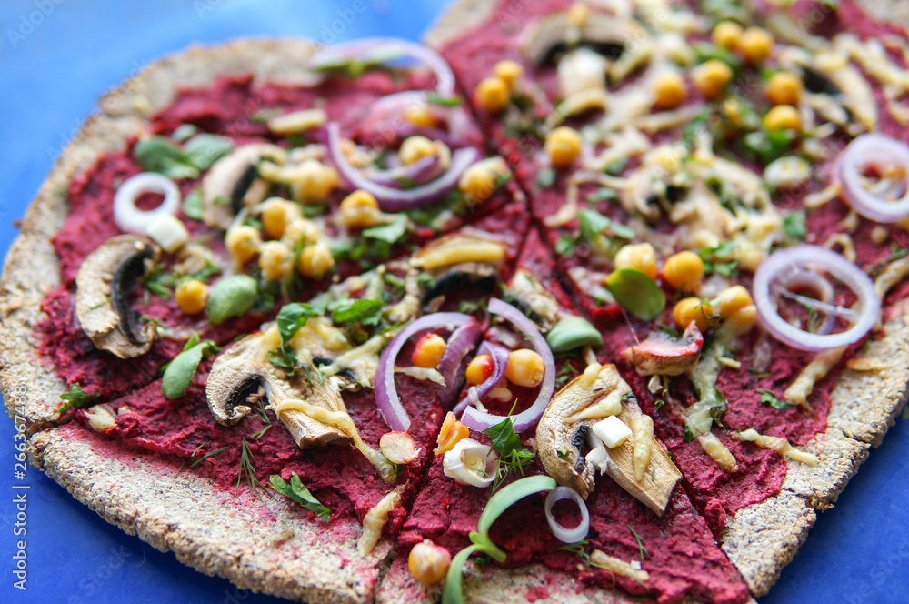 vegetarian pizza in a heart form. Delicious unusual vegan pizza