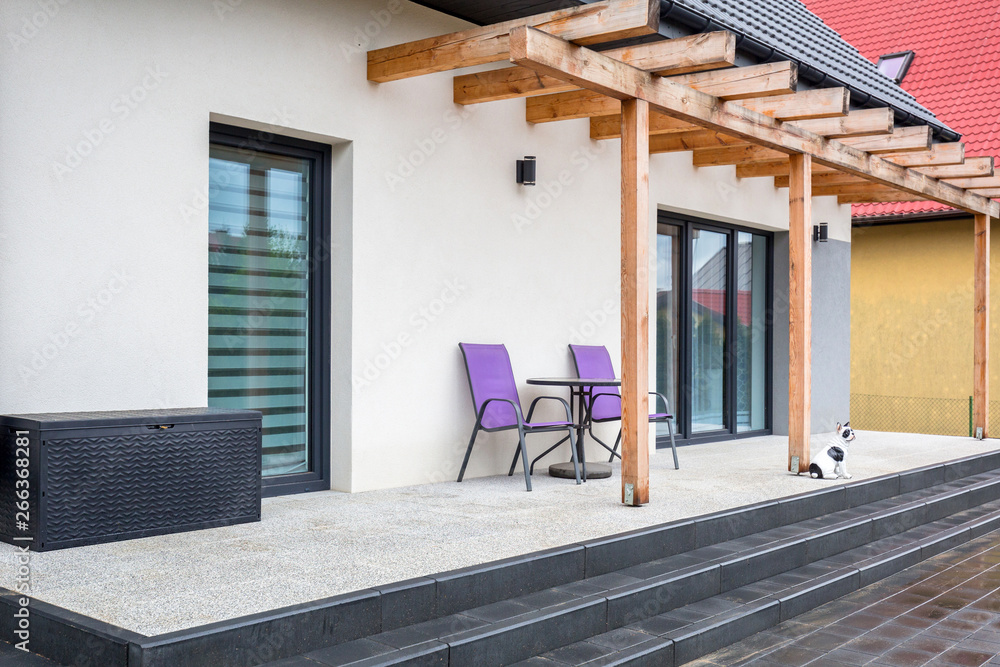 Beautiful garden terrace with new laid concrete paver blocks