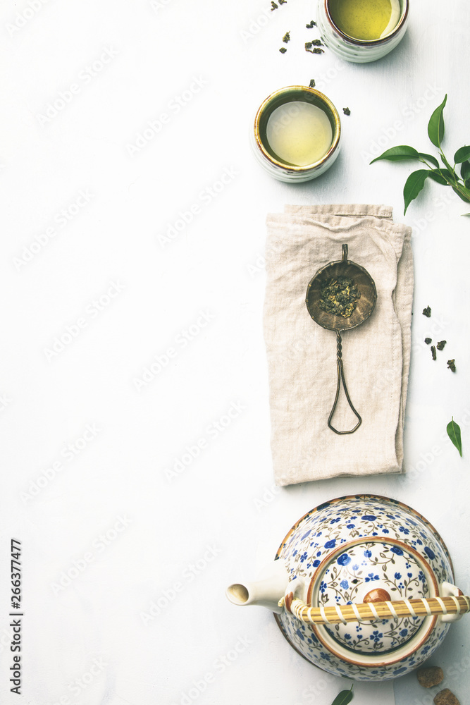 Tea composition on grey background, flat lay